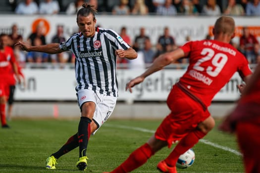 Alexander Meier (Eintracht Frankfurt) and Alexander Mißbach (TSV Steinbach).- TSV Steinbach vs. Eintracht Frankfurt on 30.07.2016 (Photo: Fingerhut)