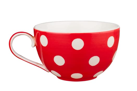 Front view of a red tea empty cup with dots isolated on white