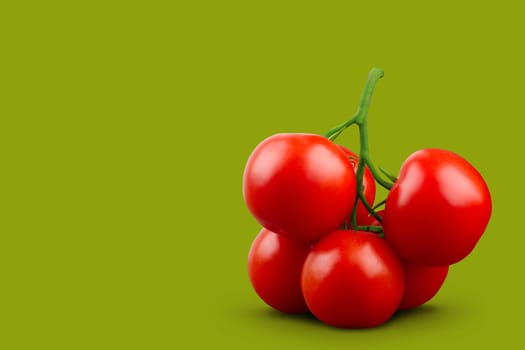 A bunch of tomatoes with green stem on green background. Horizontal, front view.