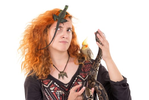 Red hair girl with several pet animals isolated in white