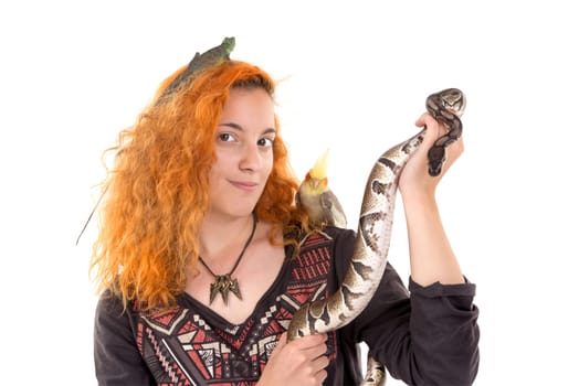 Red hair girl with several pet animals isolated in white