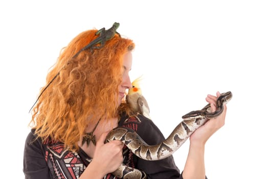Red hair girl with several pet animals isolated in white