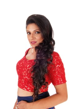 A closeup image of a very lovely woman with long curly black hair standing.from waist up isolated for white background..
