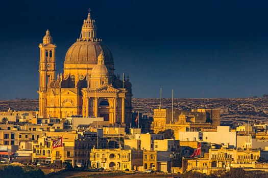 the church of Xewkija in the evening light