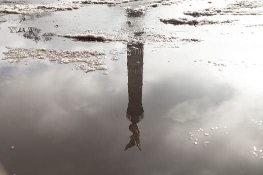 Victory column in a water reflection
