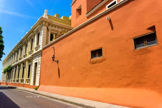 Orange and yellow colonial architecture in the historic downtown of Cartagena, Colombia