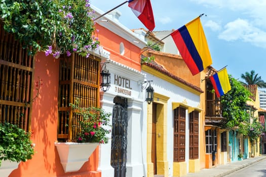 CARTAGENA, COLOMBIA - MAY 23: Row of Colombian flags hanging over colonial architecture in Cartagena, Colombia on May 23, 2016