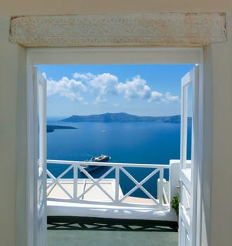 Beautiful sea view from the balcony. Oia town, Santorini island, Greece.