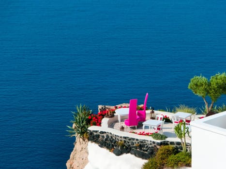 View to the sea from stairs in Oia the most beautiful village of Santorini island in Greece
