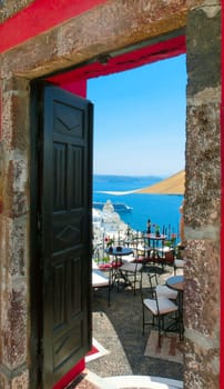 Beautiful sea view from the balcony. Oia town, Santorini island, Greece.