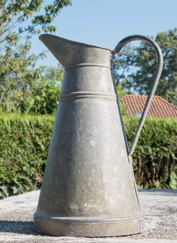 an old pewter pitcher