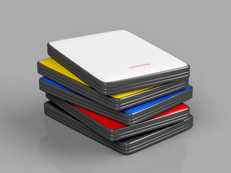 Stack with portable hard drives with different colors on shiny gray background