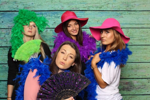 Elegant ladies in front of a photo box - women's group with Photobooth