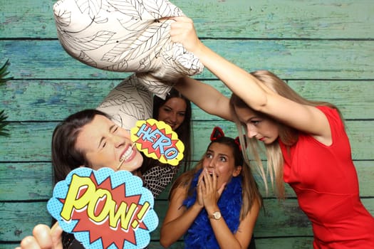Pillow fight in front of photo box - Zickenkrieg