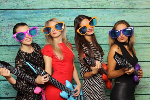Girl band with plastic guitars - Photo Booth Party