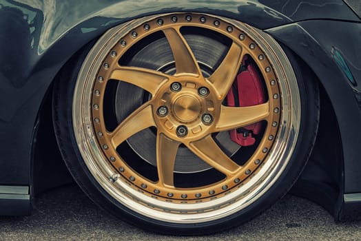 close-up of aluminum rim of luxury car wheel