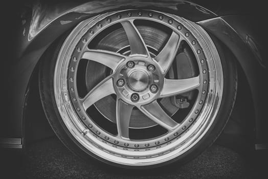 close-up of aluminum rim of luxury car wheel