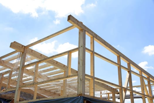 The new construction of a wooden house. Shell of a wooden house