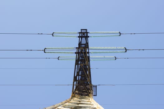 electric insulator on the background of blue sky