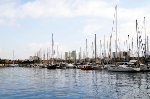 BARCELONA, SPAIN - OCTOBER 09, 2015: Yachts parked at Port Vell in Barcelona, Spain