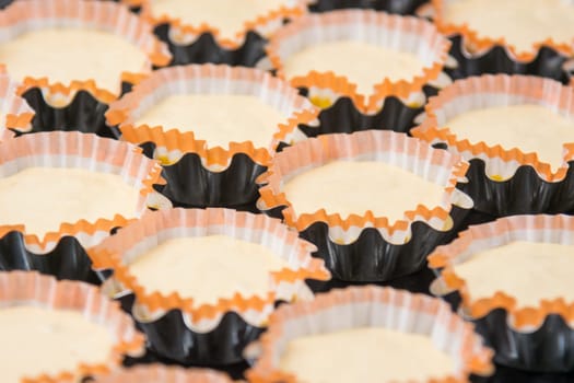 Preparations for baking cakes in molds on a baking sheet