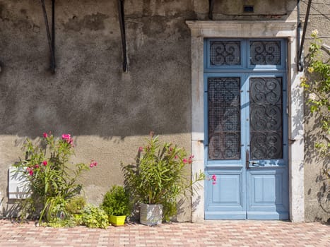 a beautiful old door painted blue