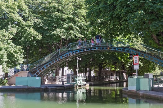 pedestrian bridge over the Saint-Martin canal in Paris, France