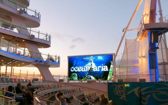 BARSELONA, SPAIN - SEPTEMBER 06, 2015: The cruise ship Allure of the Seas of Royal Caribbean International company. The view of the ship at evening
