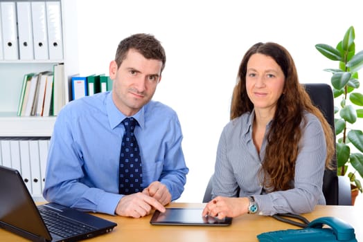 business man and business woman together in office