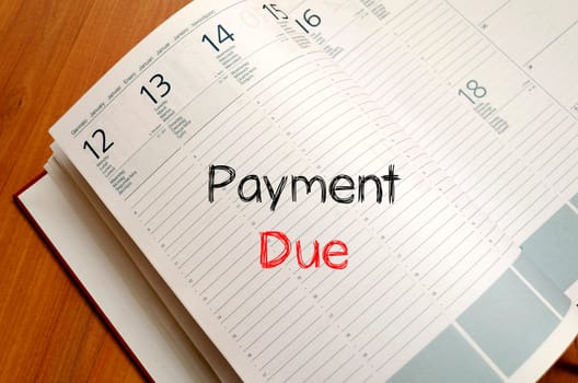 Payment due text concept write on notebook