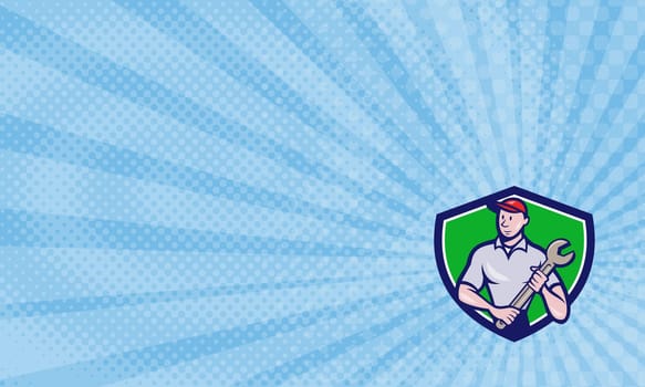Business card showing illustration of a mechanic worker standing looking to the side carrying spanner viewed from front set inside shield crest on isolated background done in cartoon style.