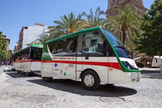 Granada, Spain - August 8, 2016: Granada City Tour with the shuttle along the Old town
