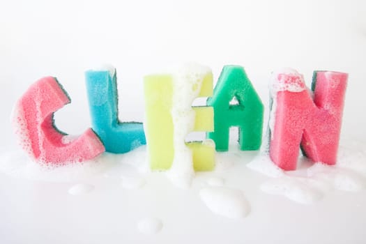 Cleaning sponge as lettering Clean with cleaning agent foam