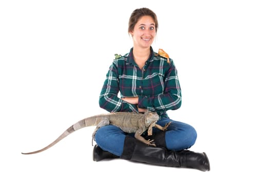 Girl with several pet animals isolated in white