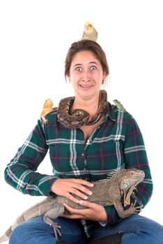 Girl with several pet animals isolated in white
