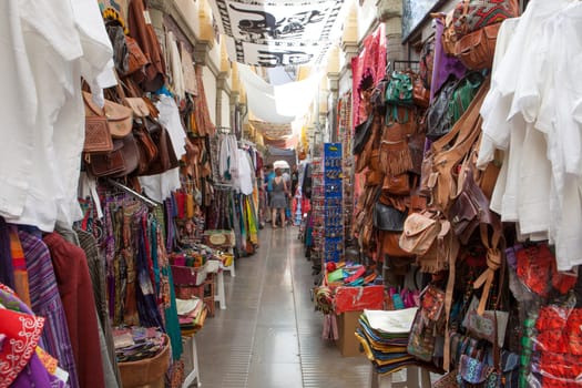 Granada, Spain - August 5, 2016: Narrow streets filled with shops called Alcaiceria, originally home to a Moorish silk market, Granada, Spain