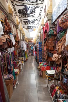 Granada, Spain - August 5, 2016: Narrow streets filled with shops called Alcaiceria, originally home to a Moorish silk market, Granada, Spain