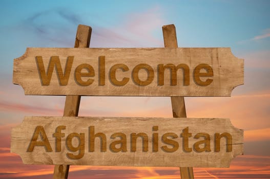 welcome to afghanistan sing on wood background