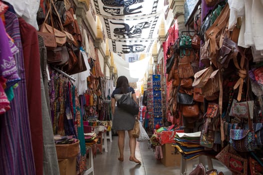 Granada, Spain - August 5, 2016: Narrow streets filled with shops called Alcaiceria, originally home to a Moorish silk market, Granada, Spain