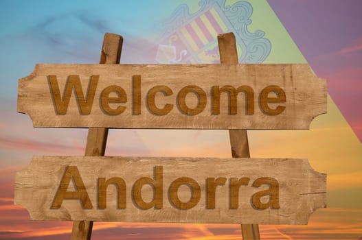 welcome to andorra sing on wood background with blending national flag