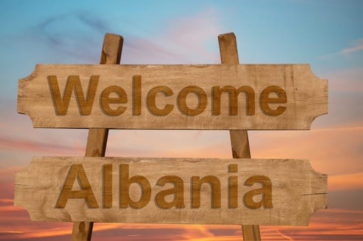 welcome to albania sing on wood background
