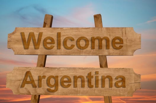welcome to argentina sing on wood background
