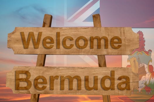 welcome to bermuda sing on wood background with blending national flag