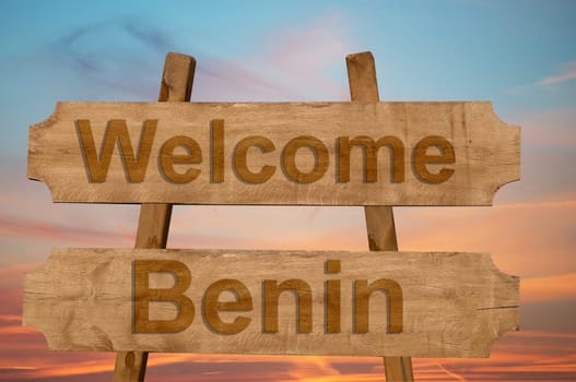 welcome to benin sing on wood background