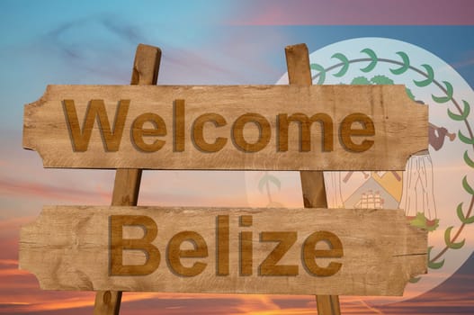 welcome to belize sing on wood background with blending national flag
