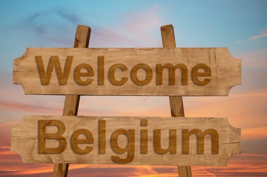 welcome to belgium sing on wood background