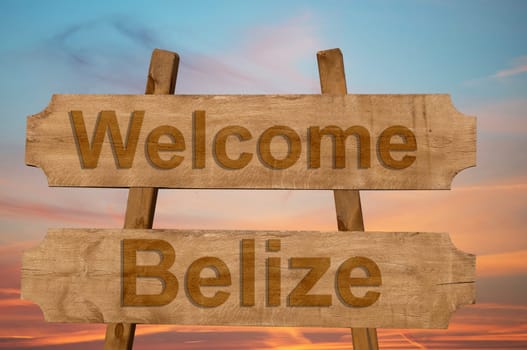 welcome to belize sing on wood background