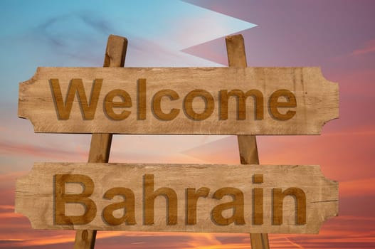 welcome to bahrin sing on wood background with blending national flag