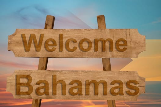 welcome to bahamas sing on wood background with blending national flag