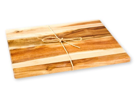 Kitchen board made of wood exposed on white background